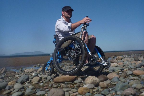 Watch how the Mountain Trike all terrain wheelchair can travel over various surfaces
